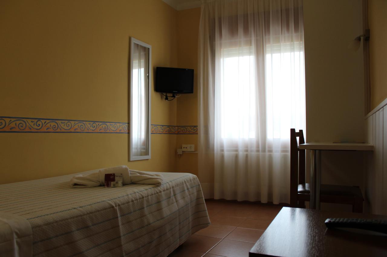 קאלדס דה מאלבלה Hostal Fabrellas חדר תמונה